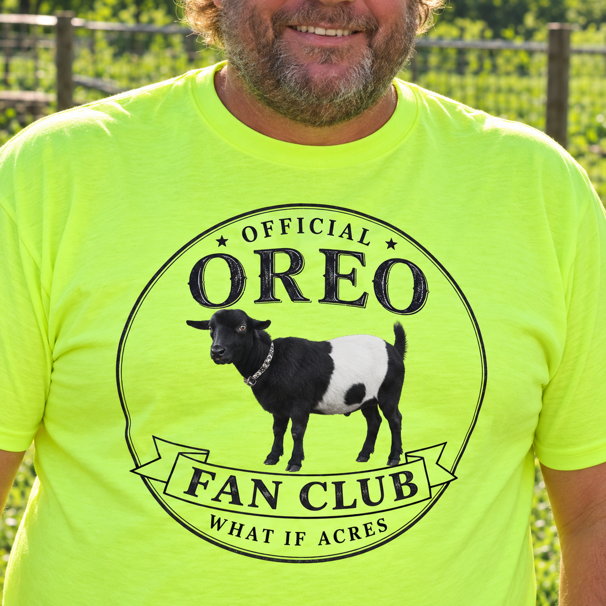Close-up of the Official Oreo Fan Club graphic on Jeff's safety green shirt at the farm.